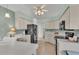 Well-equipped kitchen with stainless steel appliances and ample counter space at 4064 River Crest Cir, Leesburg, FL 34748