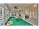 Relaxing screened porch with outdoor furniture at 4064 River Crest Cir, Leesburg, FL 34748