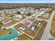 Wide aerial showcasing community and home with pool at 555 Lindsey Dr, Lakeland, FL 33809
