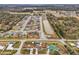 Wide aerial view of neighborhood with highlighted home at 555 Lindsey Dr, Lakeland, FL 33809