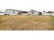 Large backyard with home, shed, and pool at 555 Lindsey Dr, Lakeland, FL 33809