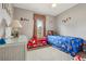 bedroom with twin bed, desk, and playful decor at 555 Lindsey Dr, Lakeland, FL 33809