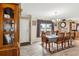 Bright dining room with wood table and chairs, and hardwood floors at 555 Lindsey Dr, Lakeland, FL 33809