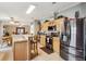 This kitchen features stainless steel appliances and an island at 555 Lindsey Dr, Lakeland, FL 33809