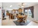 Kitchen boasts a breakfast nook, an island, and wood cabinets at 555 Lindsey Dr, Lakeland, FL 33809