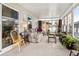 Relaxing screened porch with seating and a view of the backyard at 555 Lindsey Dr, Lakeland, FL 33809