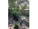 Serene backyard with a pond and lush greenery at 190 Post Way, Casselberry, FL 32707