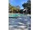 Community swimming pool with ample concrete deck space at 190 Post Way, Casselberry, FL 32707