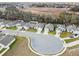 Aerial view of cul-de-sac in a residential neighborhood at 1976 Thompson Preserve Blvd, Bartow, FL 33830