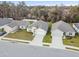 Aerial view of neighborhood with houses and street at 1976 Thompson Preserve Blvd, Bartow, FL 33830