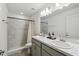 Bathroom boasts double vanity and a walk-in shower at 1976 Thompson Preserve Blvd, Bartow, FL 33830