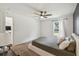 Cozy bedroom with ceiling fan and window view at 1976 Thompson Preserve Blvd, Bartow, FL 33830