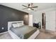 Spacious bedroom with ceiling fan and walk-in closet at 1976 Thompson Preserve Blvd, Bartow, FL 33830