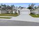 One story home with attached garage and neat landscaping at 1976 Thompson Preserve Blvd, Bartow, FL 33830