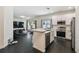 Modern kitchen with stainless steel appliances and white cabinets at 1976 Thompson Preserve Blvd, Bartow, FL 33830