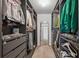 Spacious walk-in closet with ample shelving and hanging space at 1976 Thompson Preserve Blvd, Bartow, FL 33830