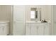 Bright bathroom boasts a double vanity and plenty of storage at 3289 Armstrong Ave, Clermont, FL 34714