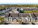 Aerial view of townhouses with parking at 305 Captiva Dr, Davenport, FL 33896