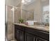 Double vanity bathroom with large shower at 305 Captiva Dr, Davenport, FL 33896