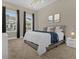 Spacious primary bedroom with large windows and plush bedding at 305 Captiva Dr, Davenport, FL 33896