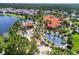 Aerial view of community pool, clubhouse, and sports courts at 4753 Vero Beach Pl, Kissimmee, FL 34746