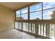 Screened lanai with tiled floors and views of the community pool at 101 N Grandview St # 312, Mount Dora, FL 32757