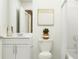 Clean bathroom with white vanity, toilet, and bathtub at 2073 Lasso Loop, Eagle Lake, FL 33839