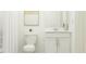 Clean bathroom with white vanity, toilet, and shower/tub combo at 2081 Lasso Loop, Eagle Lake, FL 33839