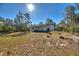 House exterior showcasing a covered porch at 3060 Granada Dr, Indian Lake Estates, FL 33855