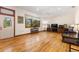 Living room with hardwood floors and ample natural light at 3060 Granada Dr, Indian Lake Estates, FL 33855