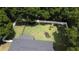 Aerial view showing home's backyard and landscaping at 36320 Piney Ridge Blvd, Fruitland Park, FL 34731