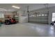 Spacious garage with ample storage space and an automatic door at 36320 Piney Ridge Blvd, Fruitland Park, FL 34731