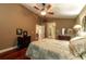 Comfortable bedroom with hardwood floors and ample closet space at 7006 Arcadian Ct, Mount Dora, FL 32757