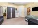 Spacious bedroom with a large closet, open doorway and full bathroom access at 422 W Division St, Clermont, FL 34715