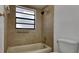 Clean bathroom with tub and shower at 6821 Rembrandt Dr, Orlando, FL 32818