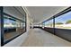Covered lanai with tile flooring and screened enclosure at 6821 Rembrandt Dr, Orlando, FL 32818