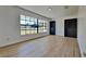 Living room with large window and built-in shelving at 6821 Rembrandt Dr, Orlando, FL 32818
