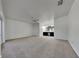 Large main bedroom with carpet, wainscoting and access to en-suite bathroom at 6821 Rembrandt Dr, Orlando, FL 32818