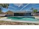 Relaxing kidney-shaped pool in a sunny backyard at 6821 Rembrandt Dr, Orlando, FL 32818