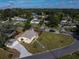 Aerial view of a single-Gathering home with a large backyard and a spacious driveway at 228 Azalea St, Lakeland, FL 33803