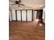 Spacious bedroom with ample closet space and wood flooring at 2541 E Lake Dr, Deland, FL 32724