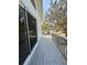 Private deck with sliding glass door access from interior at 2541 E Lake Dr, Deland, FL 32724