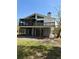 Two-story home with large deck and screened porch at 2541 E Lake Dr, Deland, FL 32724