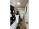 Laundry room with washer, dryer, and ample shelving at 2541 E Lake Dr, Deland, FL 32724