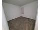 Small bedroom with neutral wall and carpeting at 400 Watusi Way, St Cloud, FL 34772