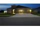 Well-lit single-Gathering home with a two-car garage and manicured front lawn at 400 Watusi Way, St Cloud, FL 34772