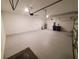 Spacious garage with automatic door opener and extra storage at 400 Watusi Way, St Cloud, FL 34772