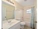 Bright bathroom featuring a shower-tub combo, single sink vanity, and modern fixtures at 4629 Nw 30Th Pl, Ocala, FL 34482