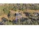 House with large backyard and surrounding trees at 5525 Tillman Rd, Lakeland, FL 33810