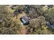 Home nestled in a wooded area with a spacious yard at 5525 Tillman Rd, Lakeland, FL 33810